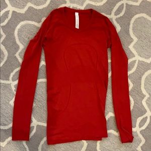 Red long sleeves shirt